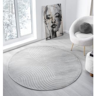 Denna produkten heter Bella Spin, tillverkad av Polyester & Polypropylen material med en vacker Grå färg - SE Mattor