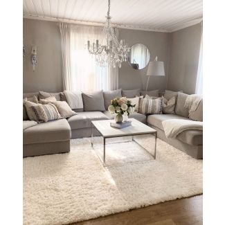 Denna produkten heter Furry, tillverkad av Polypropylen material med en vacker Offwhite färg - SE Mattor