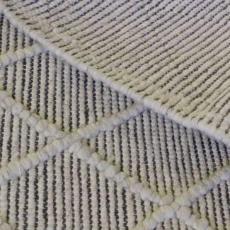 Denna produkten heter Margaux, tillverkad av Ull material med en vacker Beige färg - SE Mattor