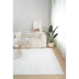 Denna produkten heter Rabbit Nest, tillverkad av Polyester material med en vacker Offwhite färg - SE Mattor