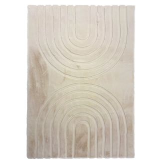 Denna produkten heter Rabbit Zen Ljusbeige Pälsmatta, tillverkad av Polyester material med en vacker Ljusbeige färg - SE Mattor